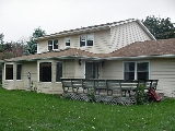 This is the back again, showing the deck and the sunroom.