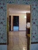 This is the view from the dining room through the kitchen into the family room.